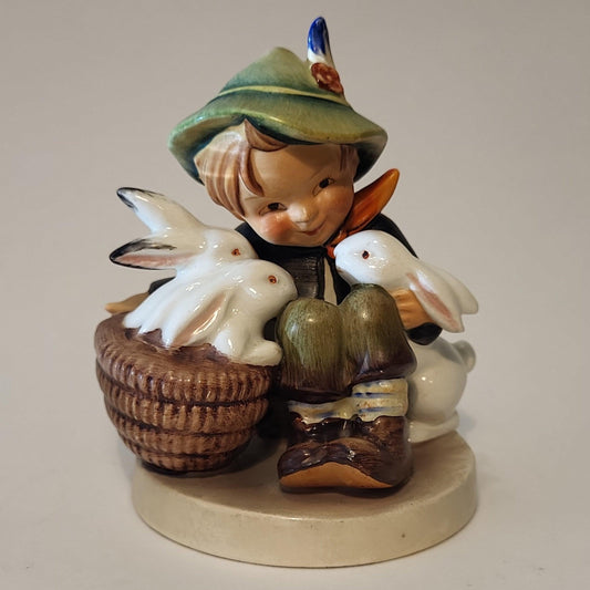 M. I. Hummel Porcelain Figurine Boy with Three Bunnies