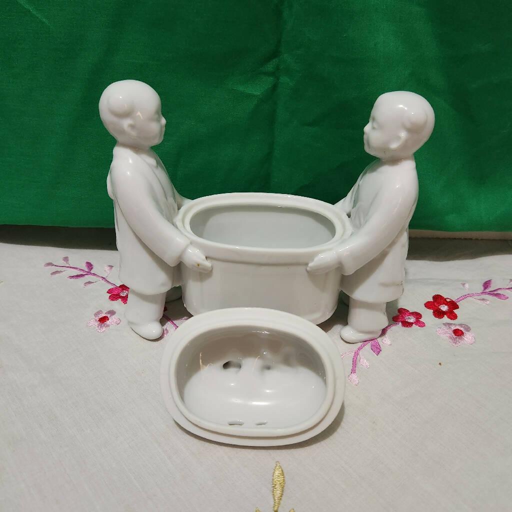 Andrea Sadek Made in Japan Porcelain White Incense burner Carried by two Boys - trèsBin
