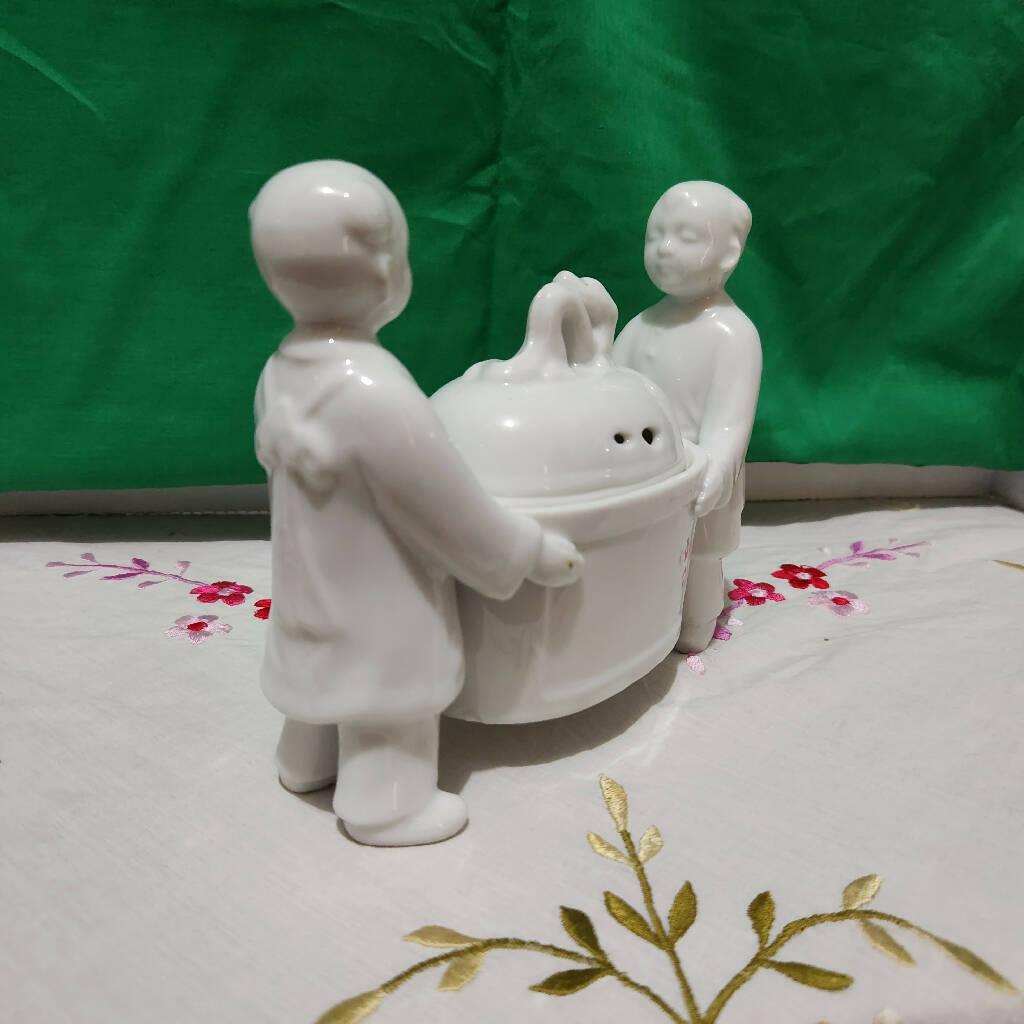 Andrea Sadek Made in Japan Porcelain White Incense burner Carried by two Boys