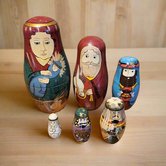 Set of colorful wooden Nativity nesting dolls made for Authentic Models