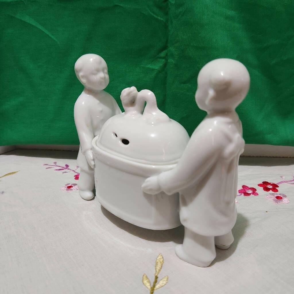 Andrea Sadek Made in Japan Porcelain White Incense burner Carried by two Boys - trèsBin