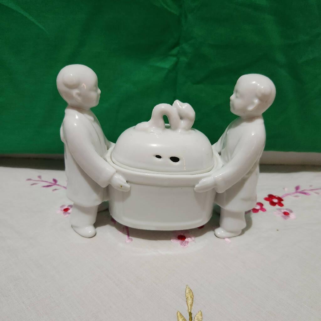 Andrea Sadek Made in Japan Porcelain White Incense burner Carried by two Boys - trèsBin