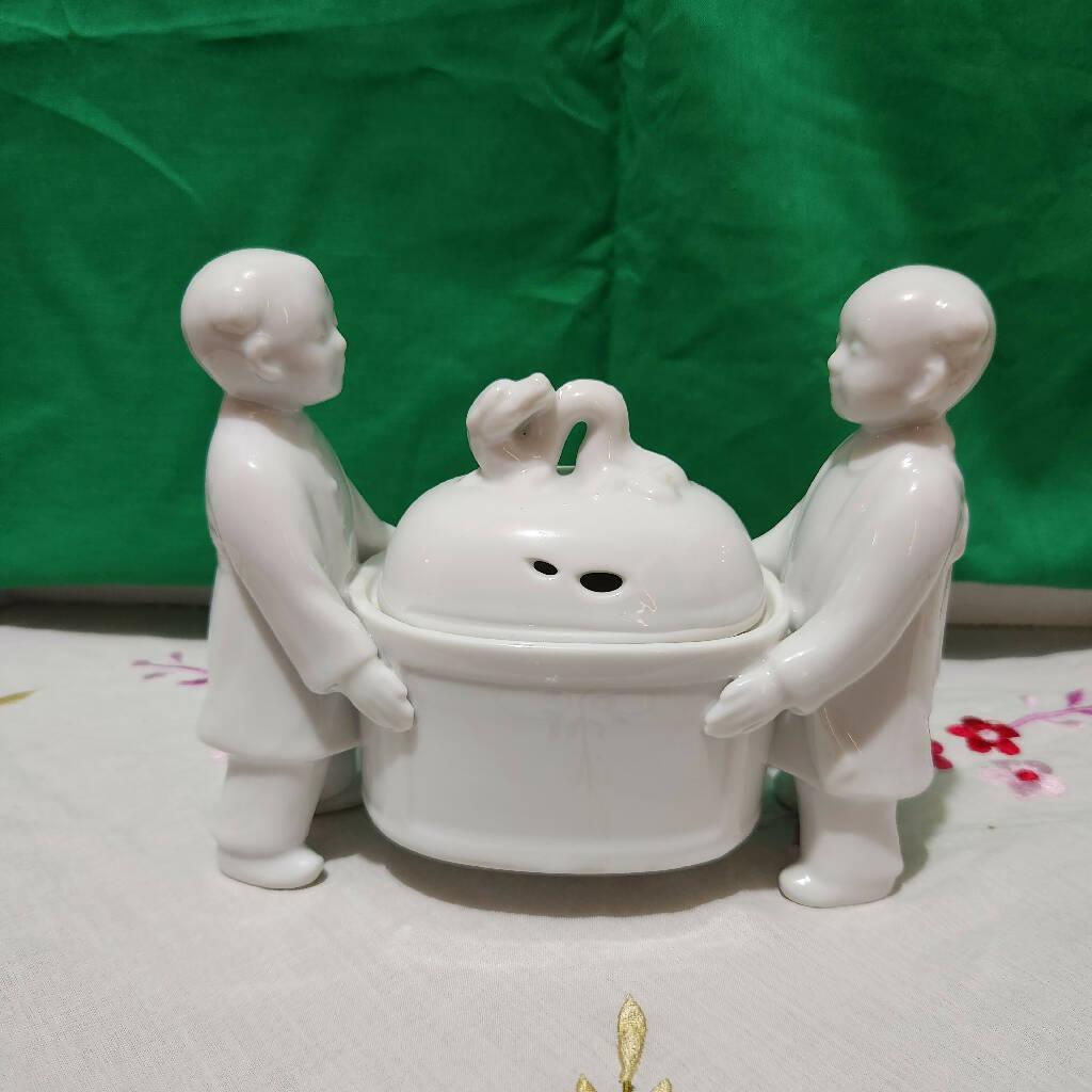 Andrea Sadek Made in Japan Porcelain White Incense burner Carried by two Boys - trèsBin